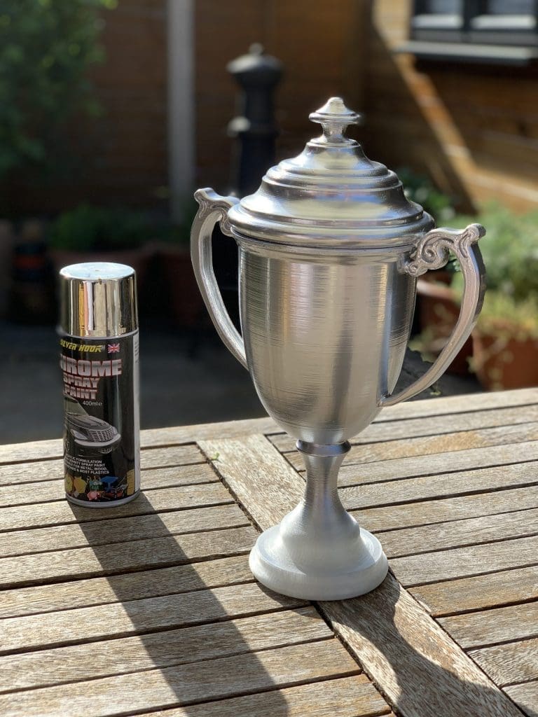 Partially sprayed replica cup